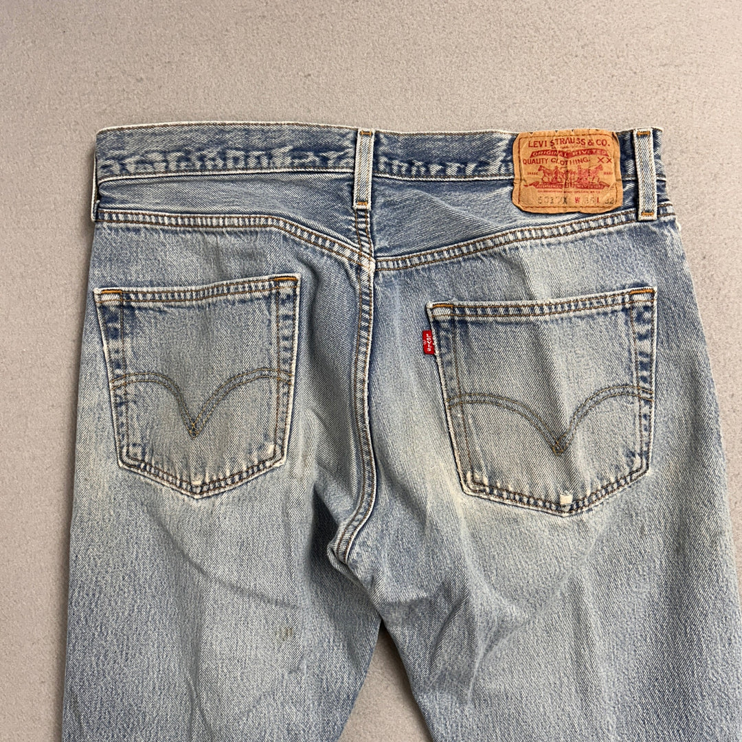 Vintage Levi's 501xx Light Wash Distressed Jeans Made in USA Men's 34x29