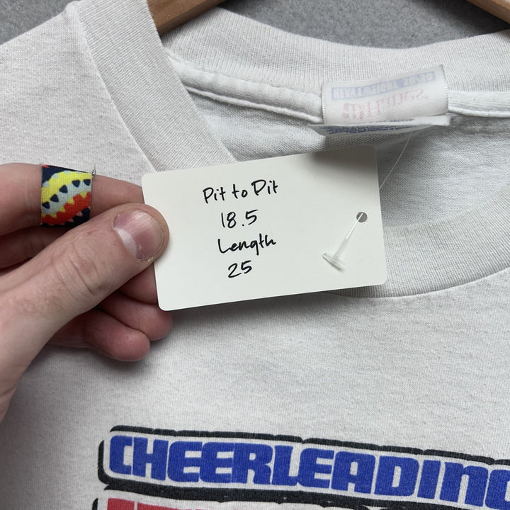"Cheerleading It's Not Just Flirts In Skirts" Y2k White Cheer Shirt Size Small