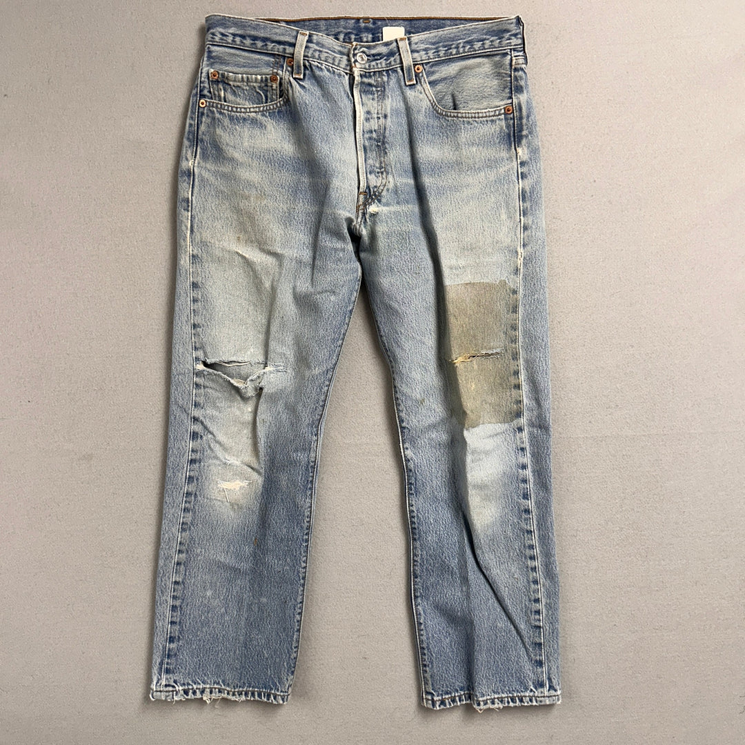 Vintage Levi's 501xx Light Wash Distressed Jeans Made in USA Men's 34x29