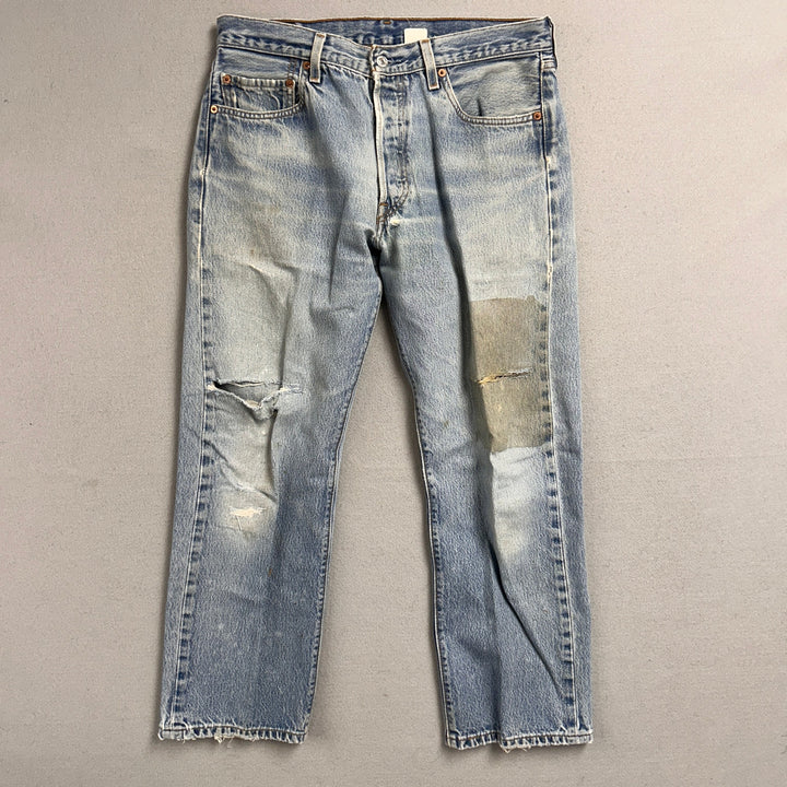 Vintage Levi's 501xx Light Wash Distressed Jeans Made in USA Men's 34x29