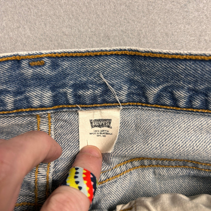Vintage Levi's 501xx Light Wash Distressed Jeans Made in USA Men's 34x29