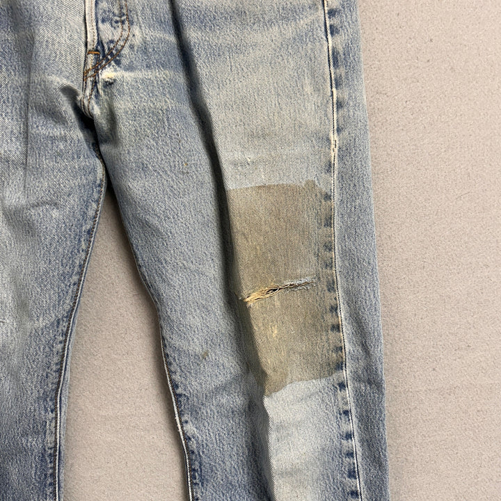 Vintage Levi's 501xx Light Wash Distressed Jeans Made in USA Men's 34x29