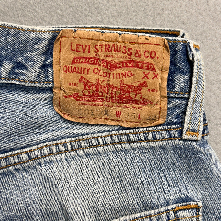 Vintage Levi's 501xx Light Wash Distressed Jeans Made in USA Men's 34x29