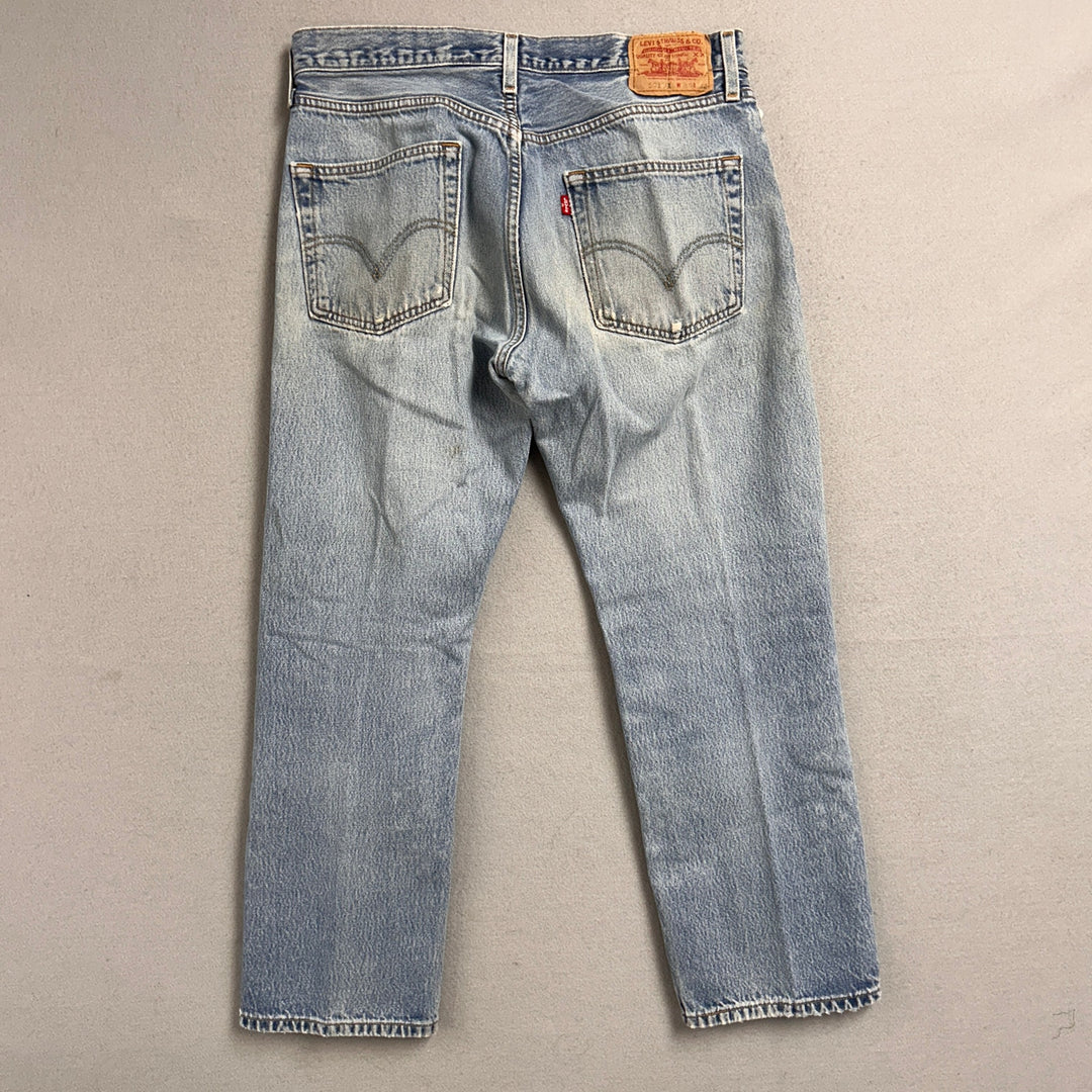 Vintage Levi's 501xx Light Wash Distressed Jeans Made in USA Men's 34x29